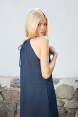 Sleeveless shift dress with halterneck and ties at back